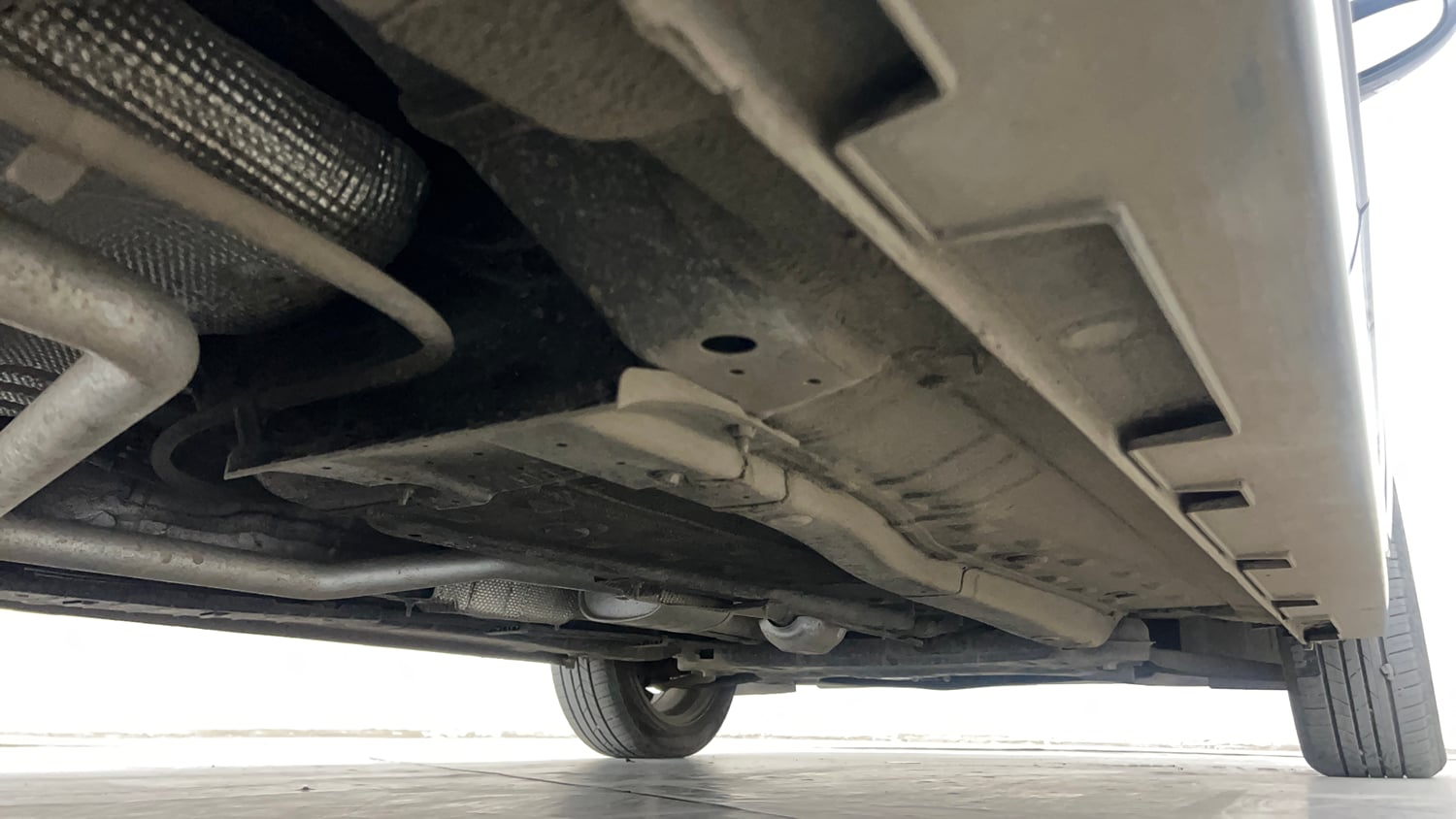 Used 2024 Hyundai New i20 Asta (O) 1.2 IVT Petrol Automatic extra REAR RIGHT UNDERBODY VIEW