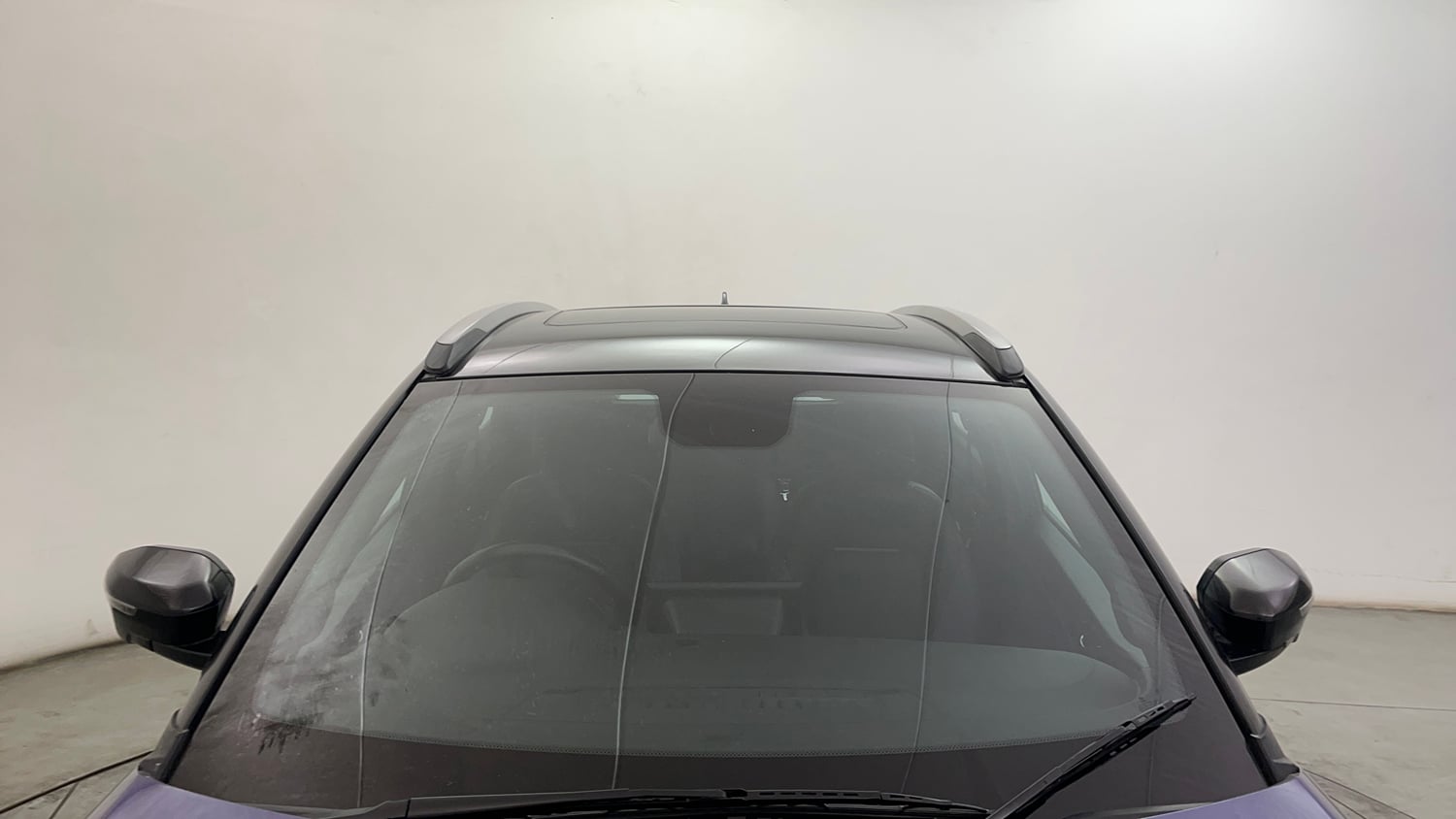 Used 2024 Tata Nexon Fearless Plus S Purple 1.2 Revotron Petrol 7DCA Dual Tone Petrol Automatic exterior FRONT WINDSHIELD VIEW