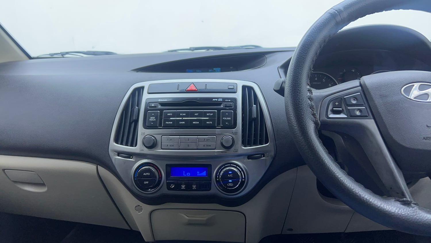 Used 2012 Hyundai i20 Sportz 1.2 Petrol Manual interior MUSIC SYSTEM & AC CONTROL VIEW