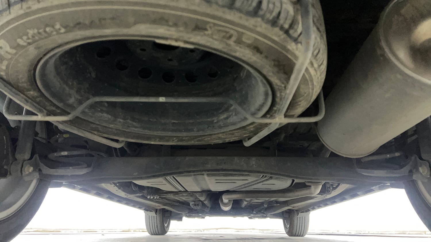 Used 2023 Maruti Suzuki XL6 Zeta AT Petrol Petrol Automatic extra REAR UNDERBODY VIEW (TAKEN FROM REAR)
