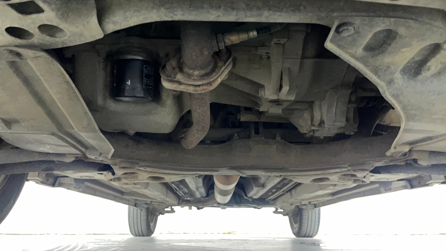 Used 2015 Maruti Suzuki Swift Dzire ZXI Petrol Manual extra FRONT LEFT UNDERBODY VIEW