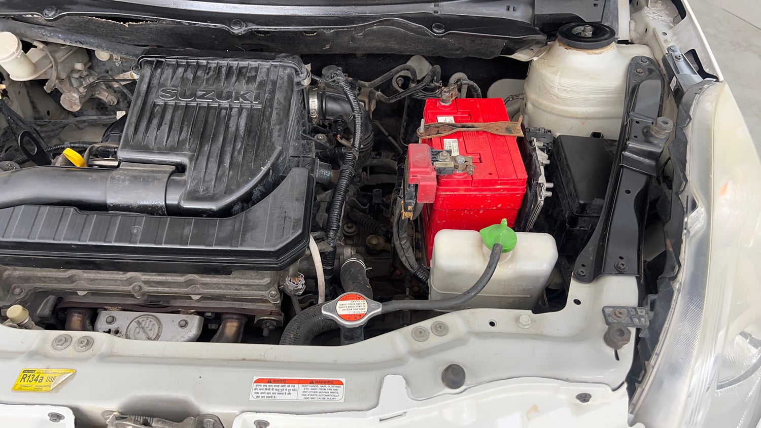 Used 2012 Maruti Suzuki Swift Dzire ZXI Petrol Manual engine ENGINE LEFT SIDE VIEW