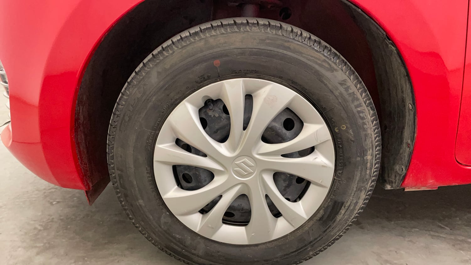 Used 2020 Maruti Suzuki Swift VXi Petrol Manual tyres LEFT FRONT TYRE RIM VIEW