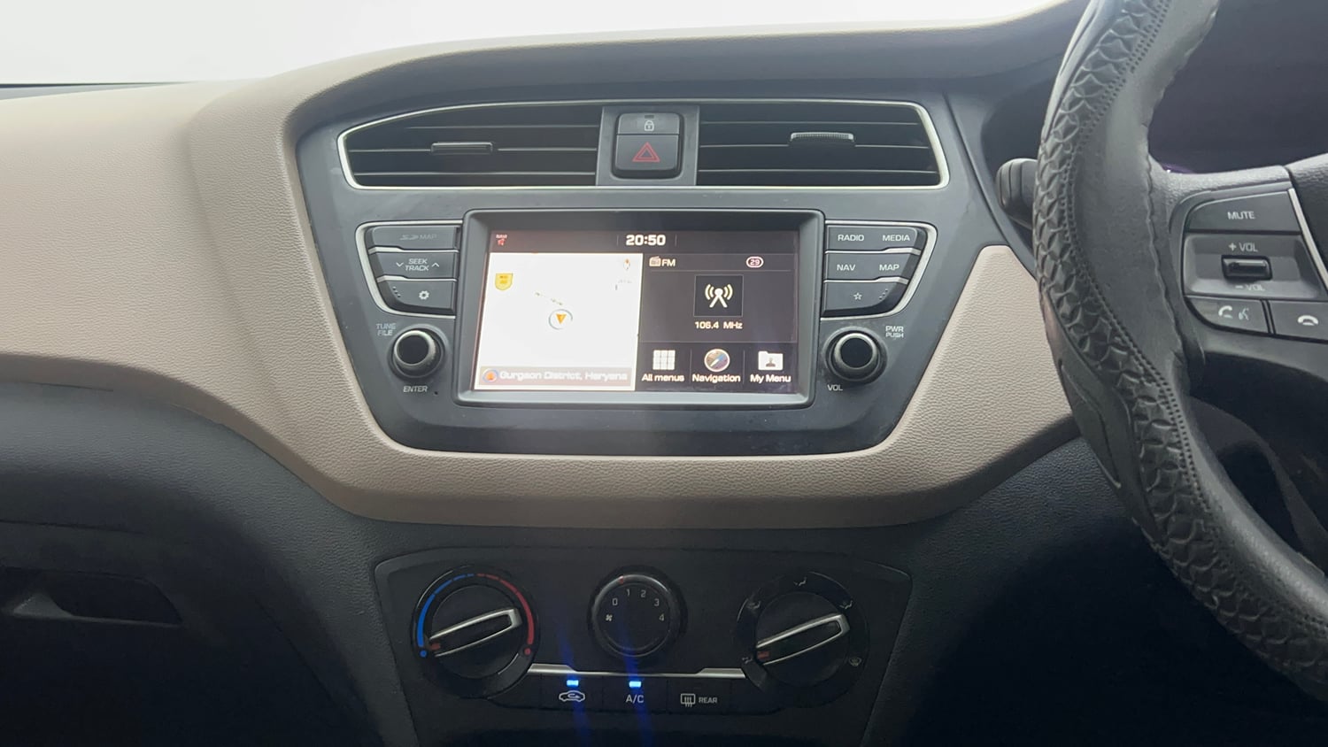 Used 2019 Hyundai Elite i20 Sportz Plus 1.2 Petrol Manual interior MUSIC SYSTEM & AC CONTROL VIEW