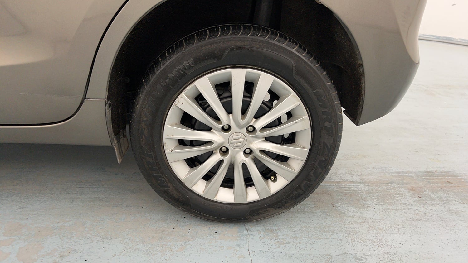 Used 2021 Maruti Suzuki Baleno Delta Petrol Manual tyres LEFT REAR TYRE RIM VIEW
