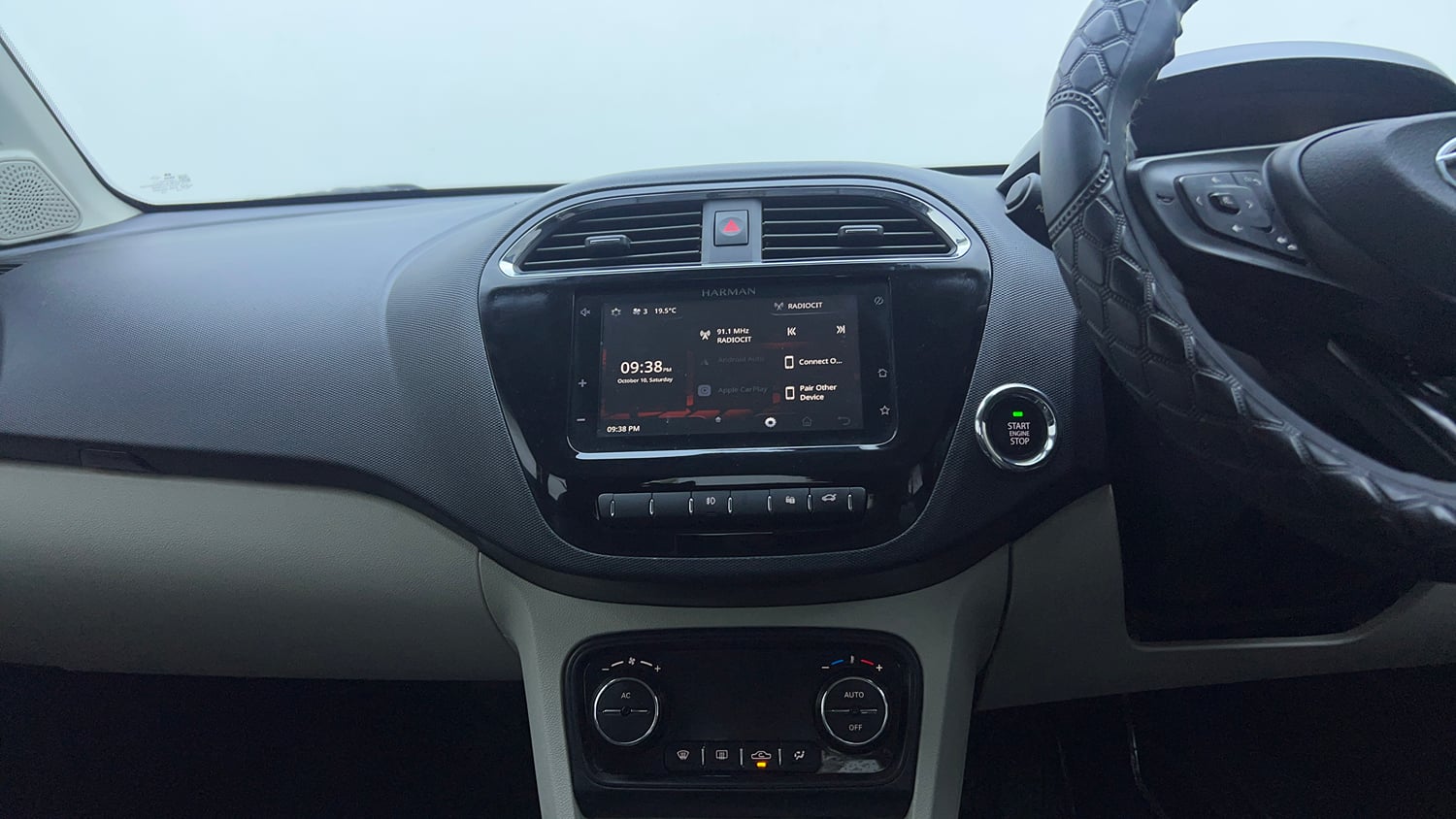 Used 2023 Tata Tigor XZ Plus Petrol Manual top_features Integrated (in-dash) music system
