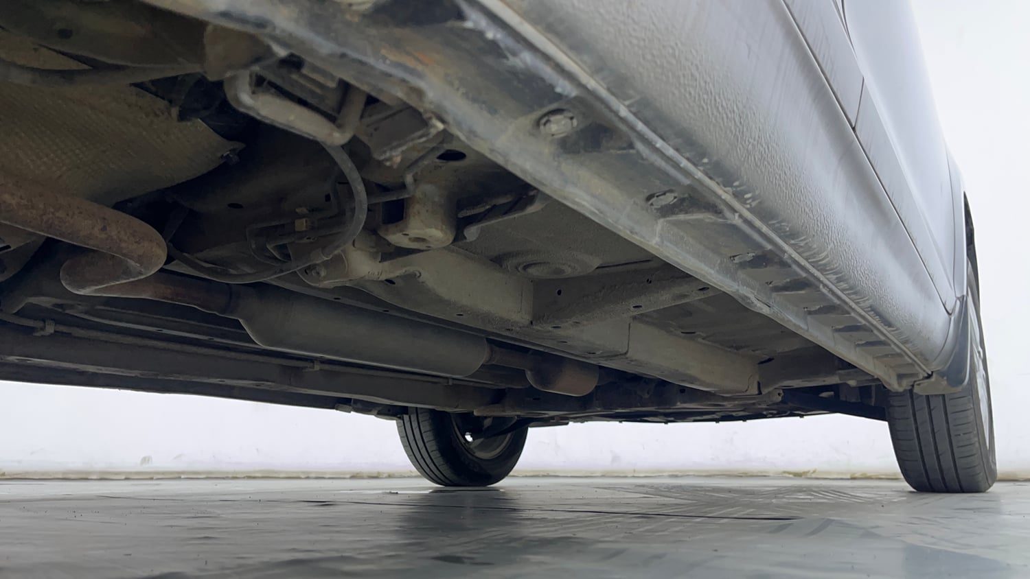 Used 2015 Maruti Suzuki Swift Dzire ZXI Petrol Manual extra REAR RIGHT UNDERBODY VIEW