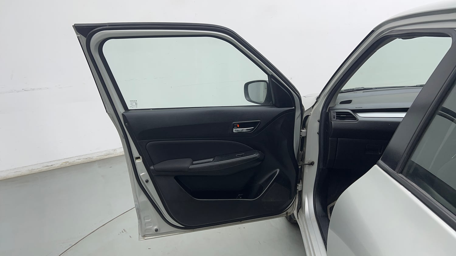 Used 2021 Maruti Suzuki Swift VXi Petrol Manual interior LEFT FRONT DOOR OPEN VIEW