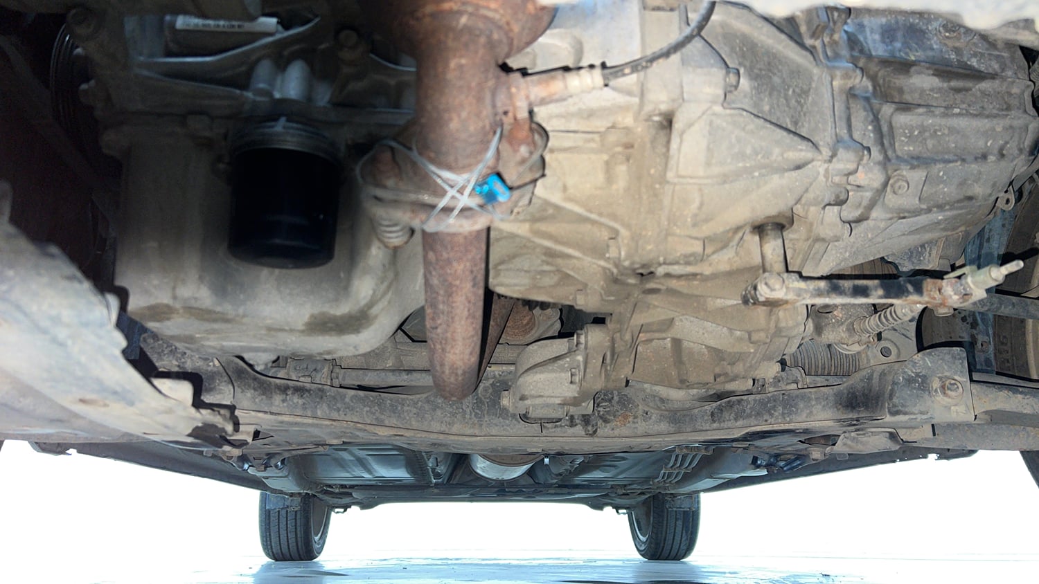 Used 2015 Maruti Suzuki Baleno Zeta 1.2 Petrol Manual extra FRONT LEFT UNDERBODY VIEW