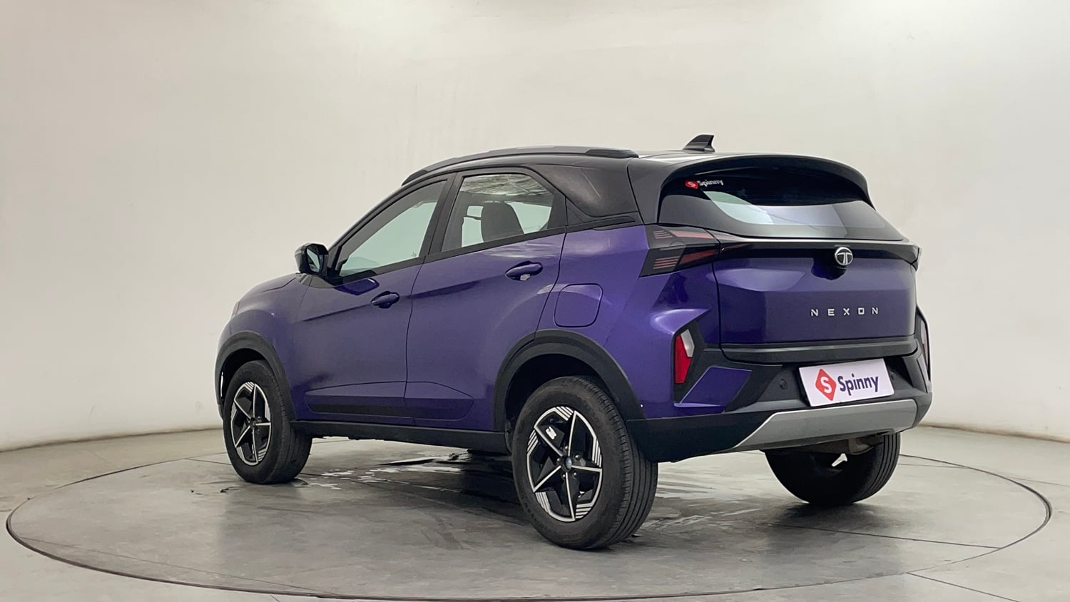 Used 2024 Tata Nexon Fearless Plus S Purple 1.2 Revotron Petrol 7DCA Dual Tone Petrol Automatic exterior LEFT REAR CORNER VIEW