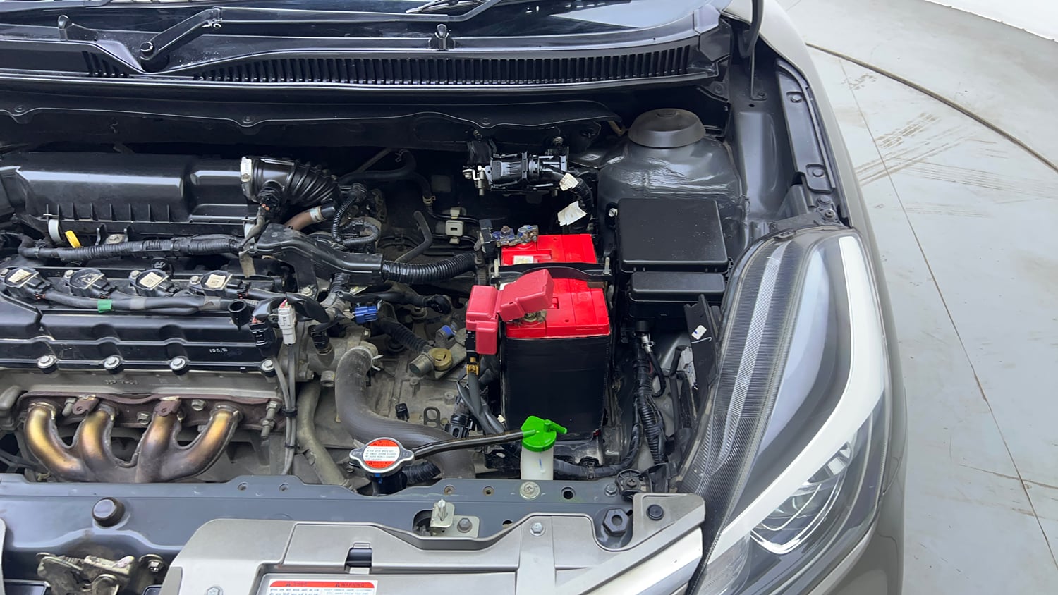 Used 2019 Maruti Suzuki Baleno Delta Petrol Manual engine ENGINE LEFT SIDE VIEW