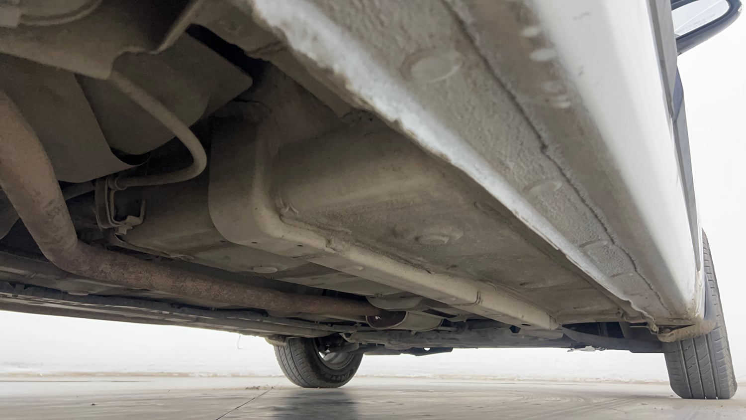 Used 2015 Hyundai Grand i10 Sportz AT 1.2 Kappa VTVT Petrol Automatic extra REAR RIGHT UNDERBODY VIEW