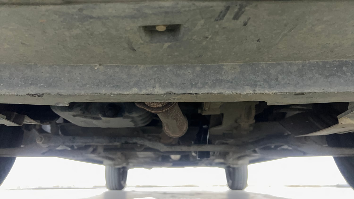 Used 2021 Tata Tigor XM Petrol Manual extra FRONT LEFT UNDERBODY VIEW