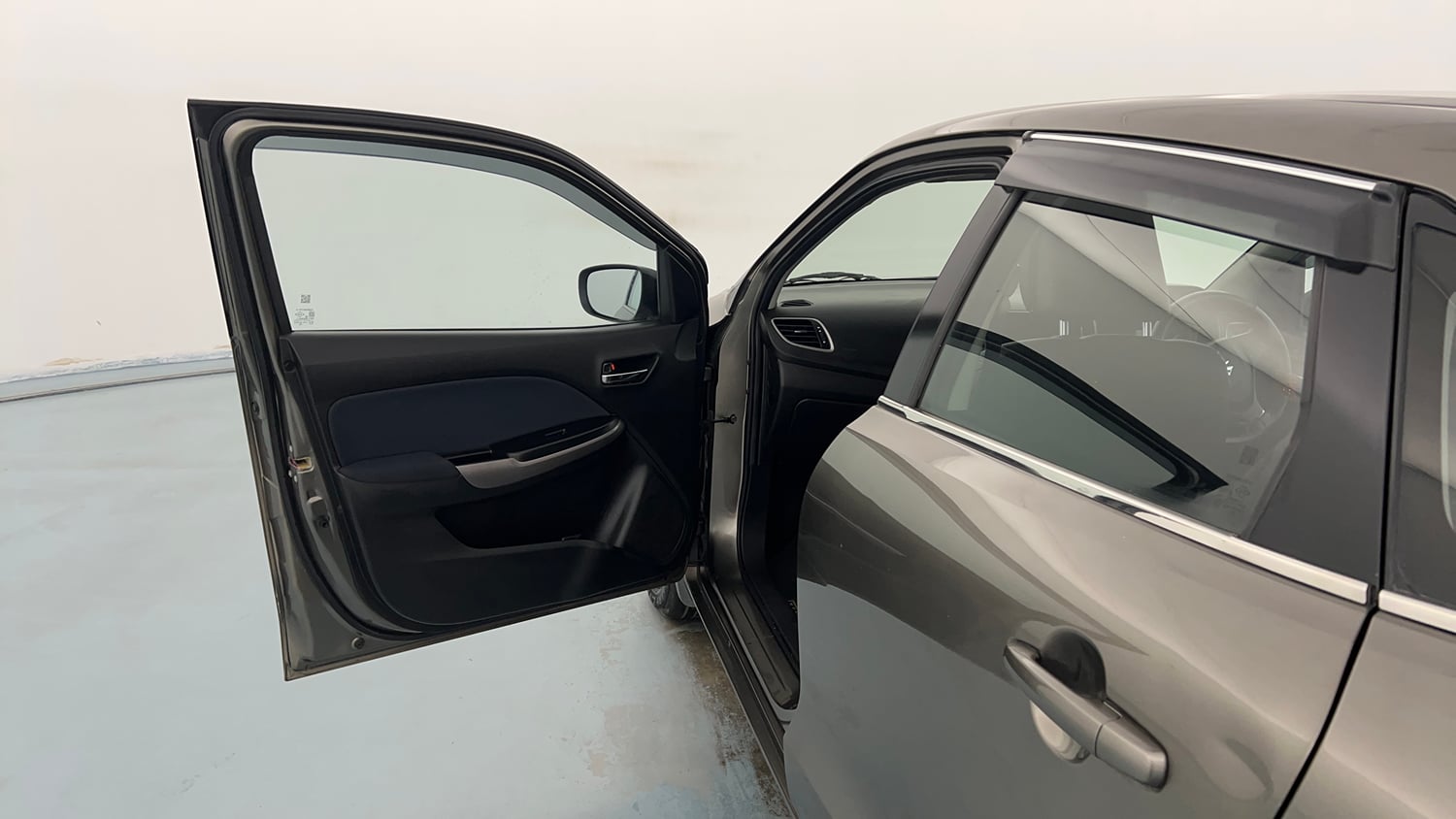 Used 2021 Maruti Suzuki Baleno Delta Petrol Manual interior LEFT FRONT DOOR OPEN VIEW