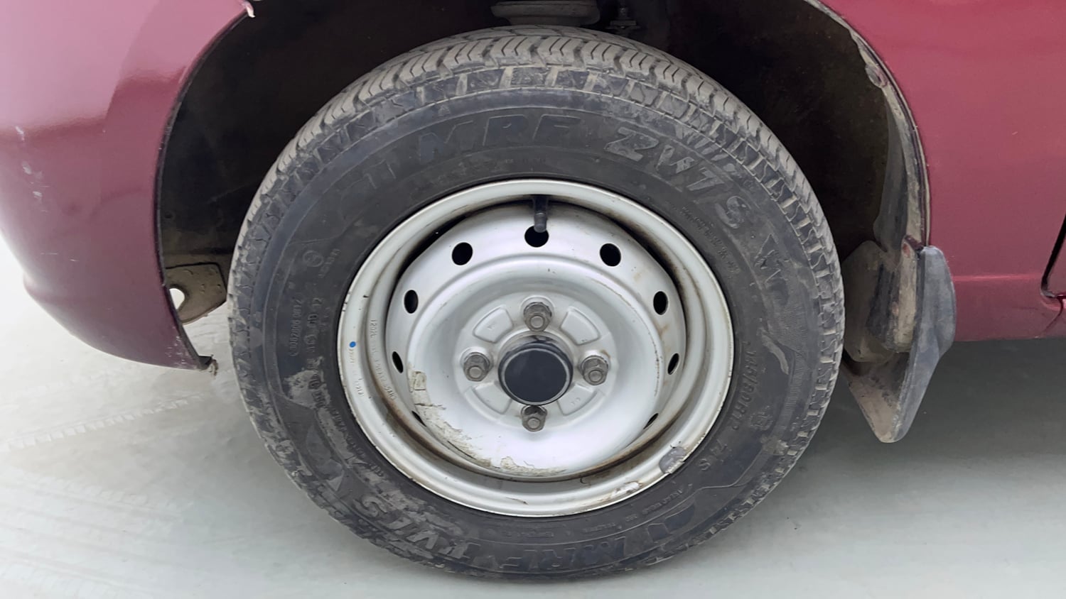 Used 2012 Maruti Suzuki Alto LXi BS-IV Petrol Manual tyres LEFT FRONT TYRE RIM VIEW