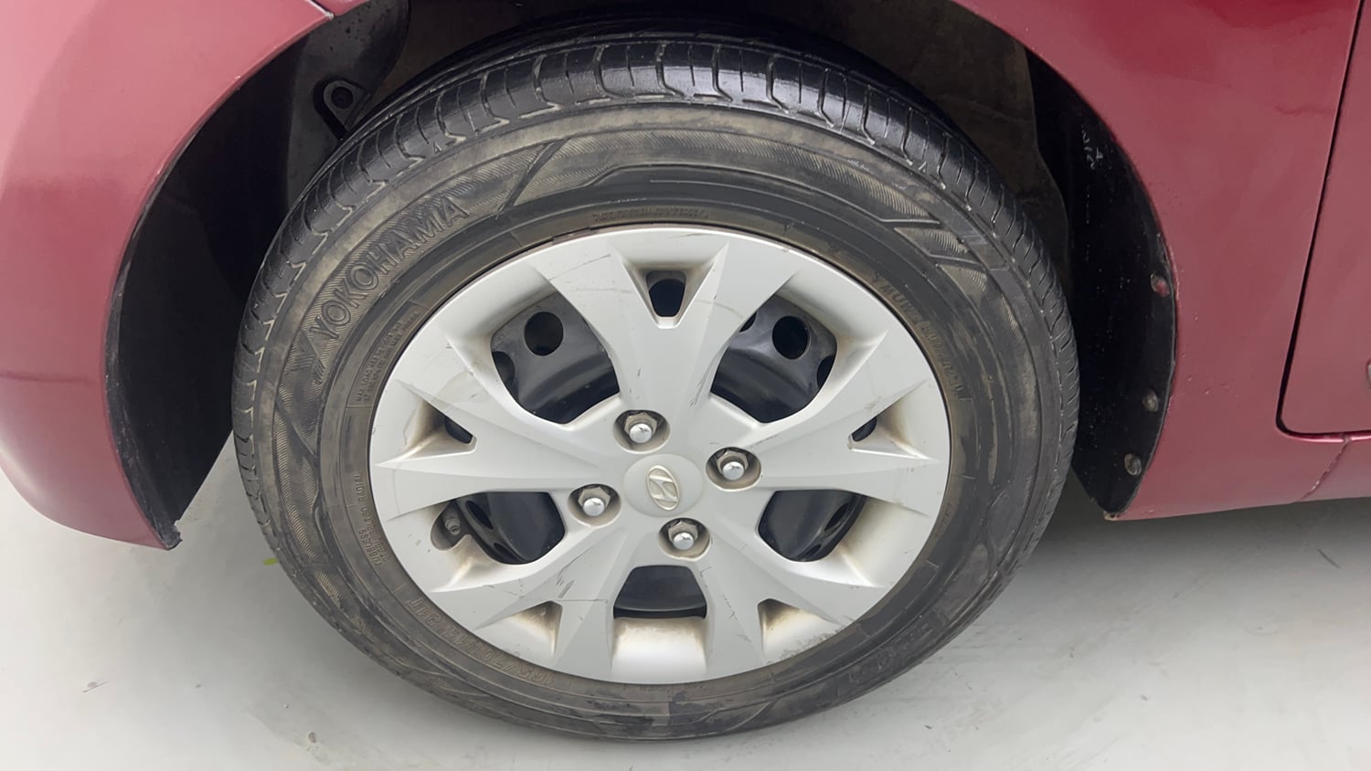 Used 2015 Hyundai Grand i10 Sportz 1.2 Kappa VTVT Petrol Manual tyres LEFT FRONT TYRE RIM VIEW