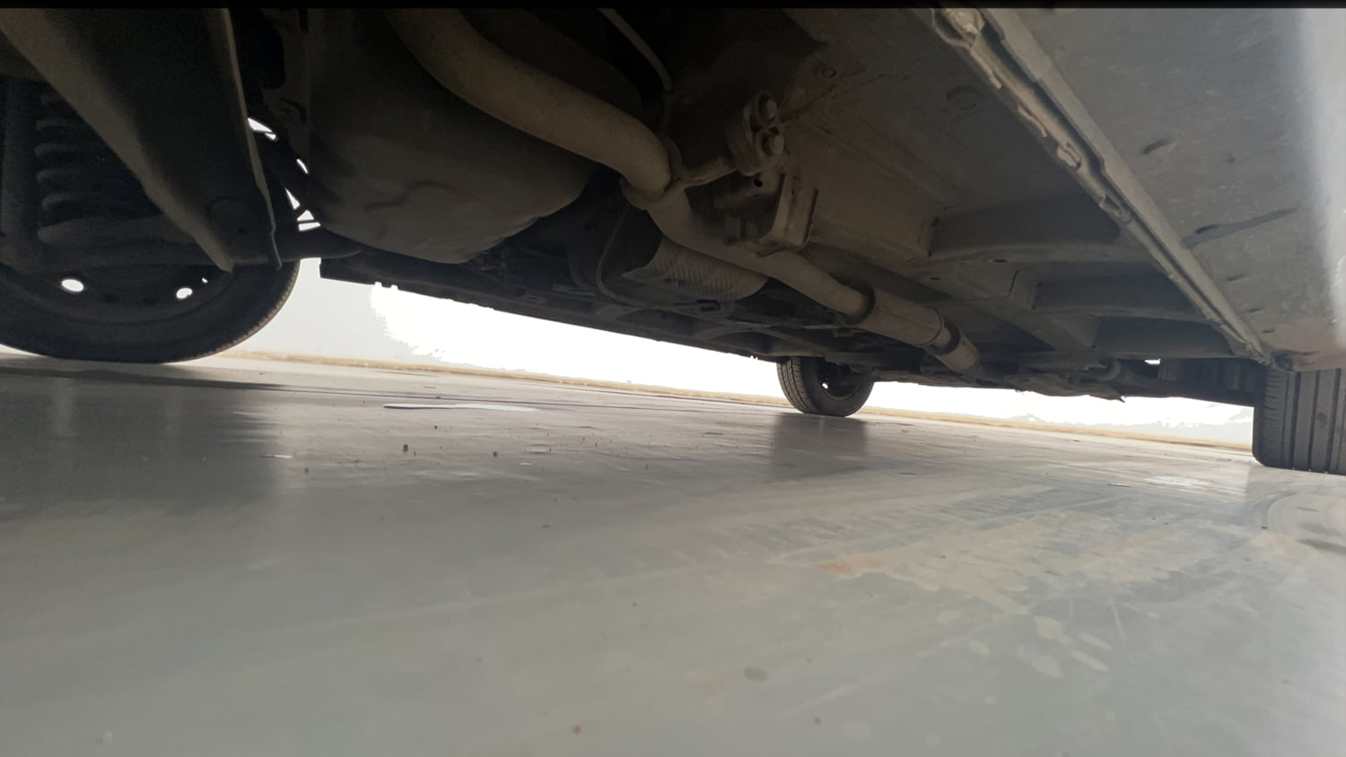 Used 2018 Mahindra KUV100 NXT K6 Plus 6 STR Petrol Manual extra REAR RIGHT UNDERBODY VIEW