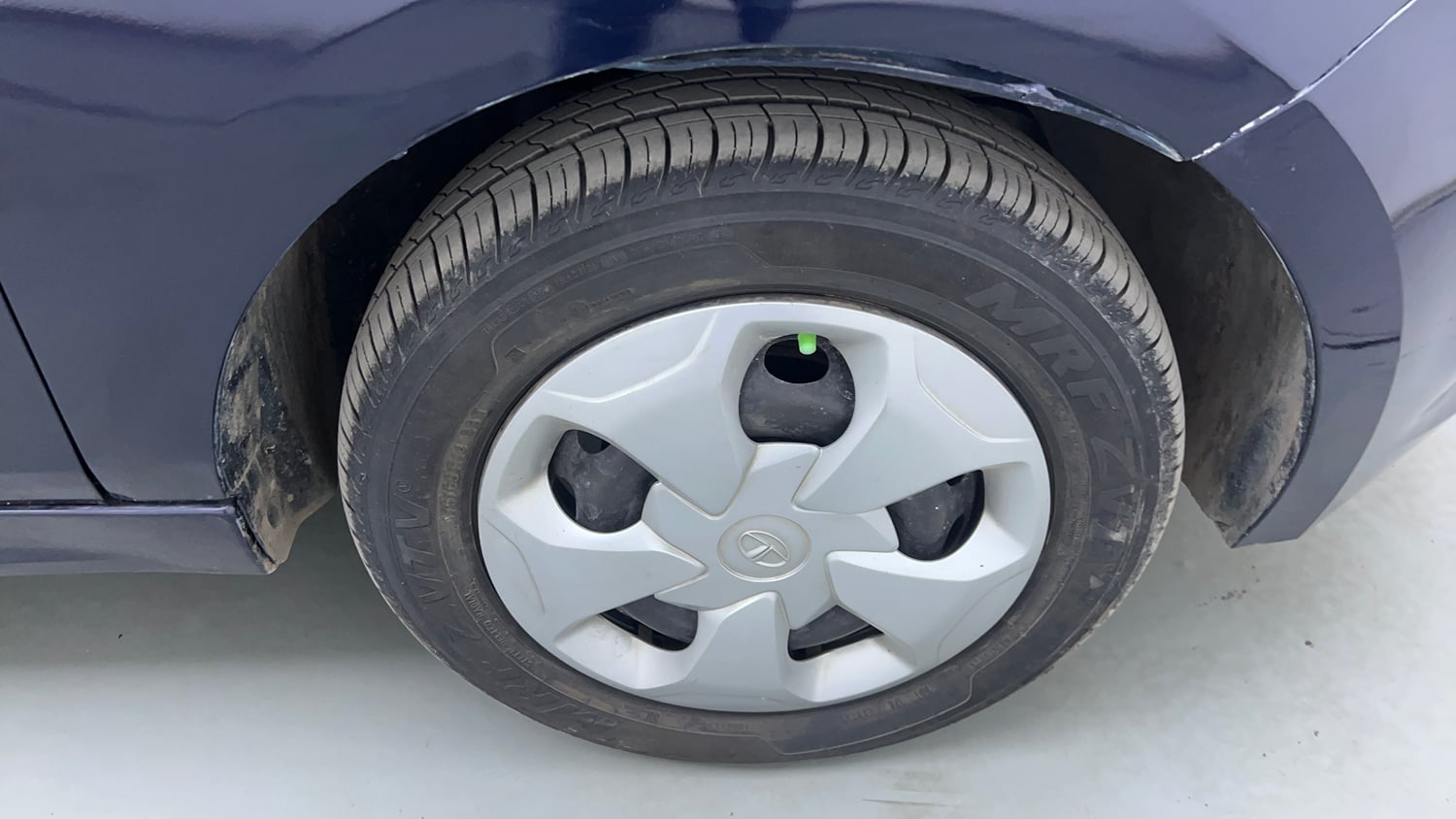 Used 2021 Tata Tigor XM Petrol Manual tyres RIGHT FRONT TYRE RIM VIEW