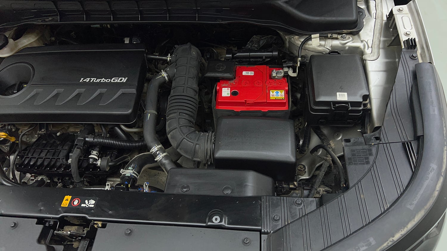 Used 2022 Kia Carens Prestige Plus 1.4 Petrol MT 7 STR Petrol Manual engine ENGINE LEFT SIDE VIEW