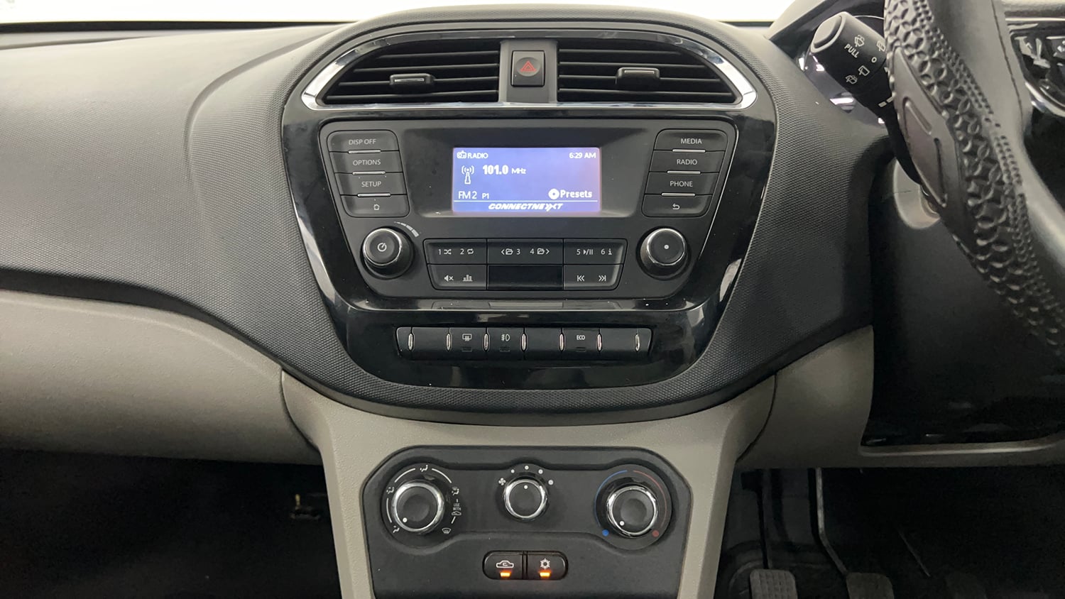 Used 2018 Tata Tiago Revotron XZ Petrol Manual interior MUSIC SYSTEM & AC CONTROL VIEW