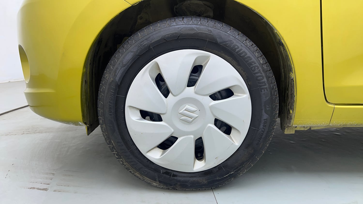 Used 2014 Maruti Suzuki Celerio VXi AMT Petrol Automatic tyres LEFT FRONT TYRE RIM VIEW