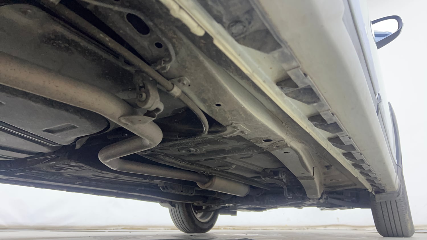 Used 2023 Maruti Suzuki XL6 Zeta AT Petrol Petrol Automatic extra REAR RIGHT UNDERBODY VIEW