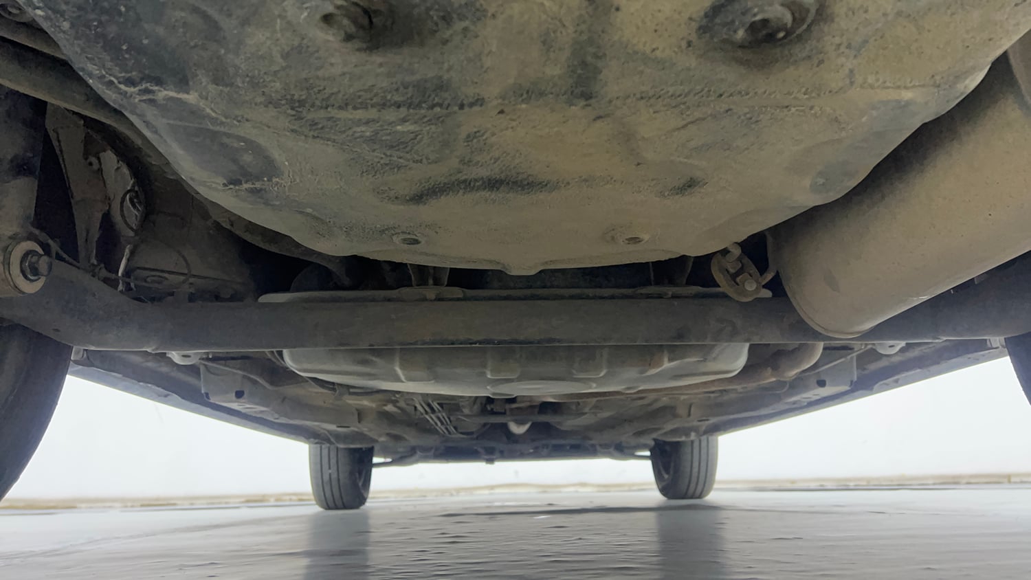 Used 2021 Tata Tigor XM Petrol Manual extra REAR UNDERBODY VIEW (TAKEN FROM REAR)