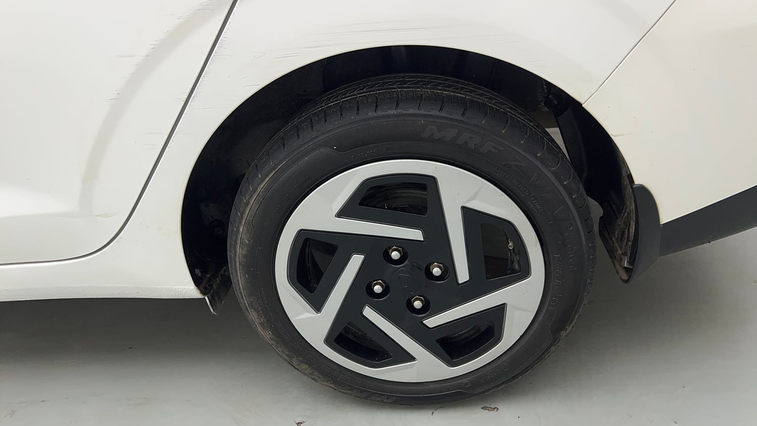 Used 2023 Hyundai Aura S 1.2 Petrol Petrol Manual tyres LEFT REAR TYRE RIM VIEW