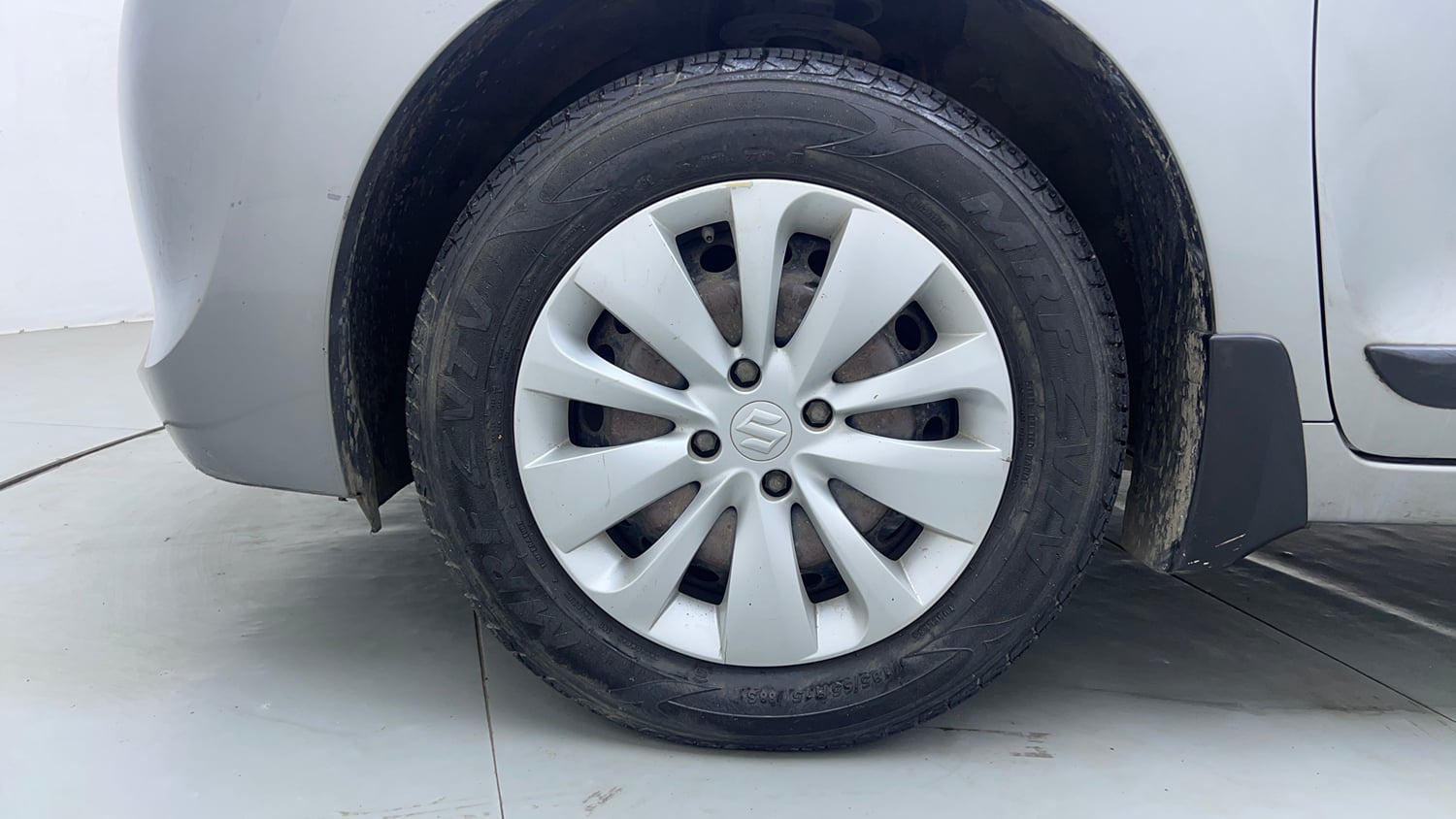 Used 2018 Maruti Suzuki Baleno Delta 1.2 Petrol Manual tyres LEFT FRONT TYRE RIM VIEW