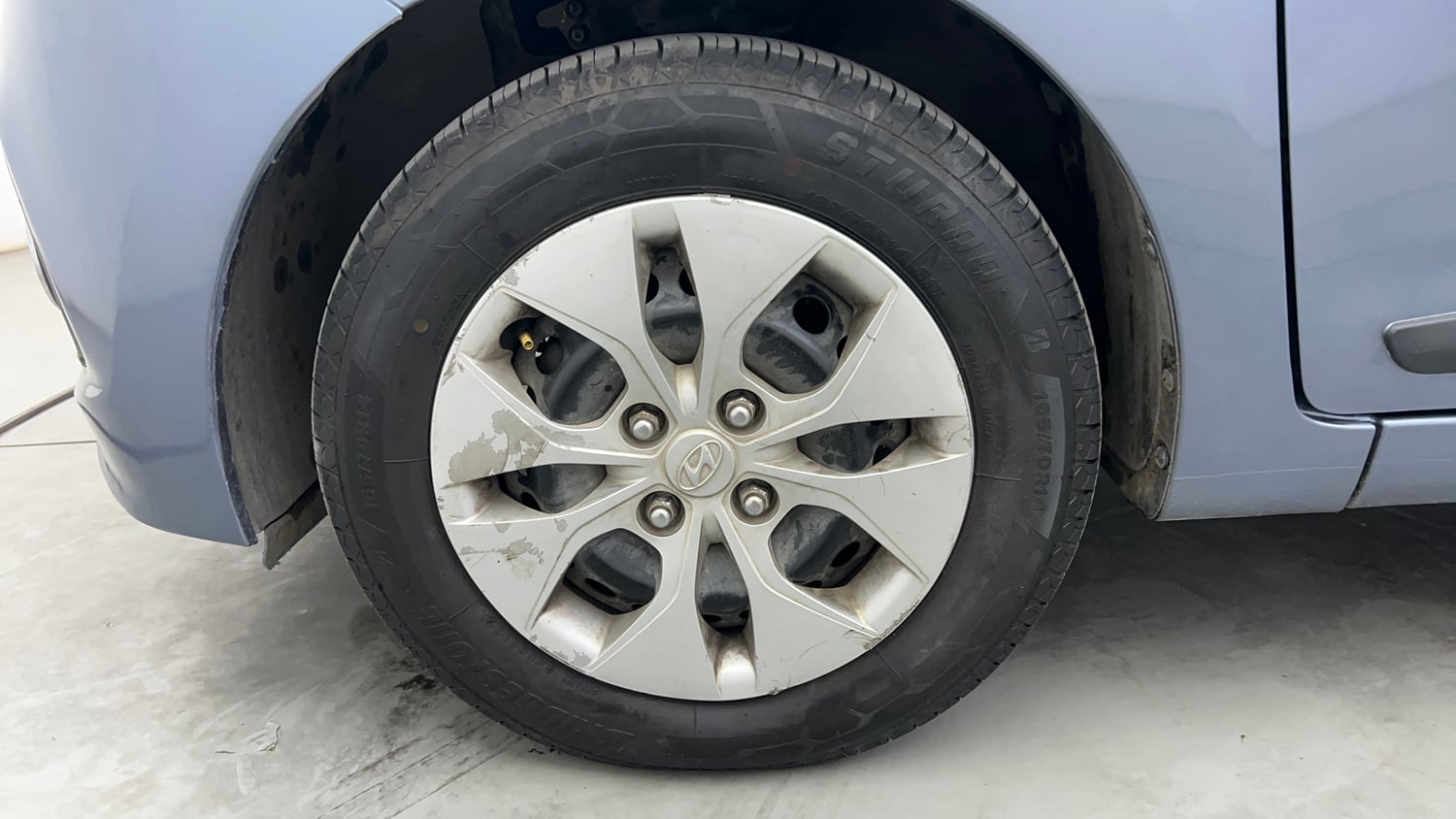 Used 2015 Hyundai Xcent S 1.2 Petrol Manual tyres LEFT FRONT TYRE RIM VIEW