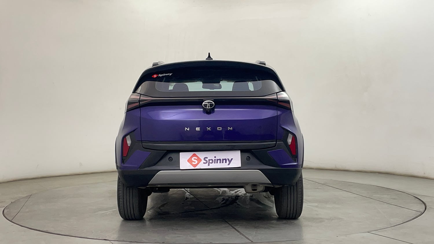 Used 2024 Tata Nexon Fearless Plus S Purple 1.2 Revotron Petrol 7DCA Dual Tone Petrol Automatic exterior BACK VIEW