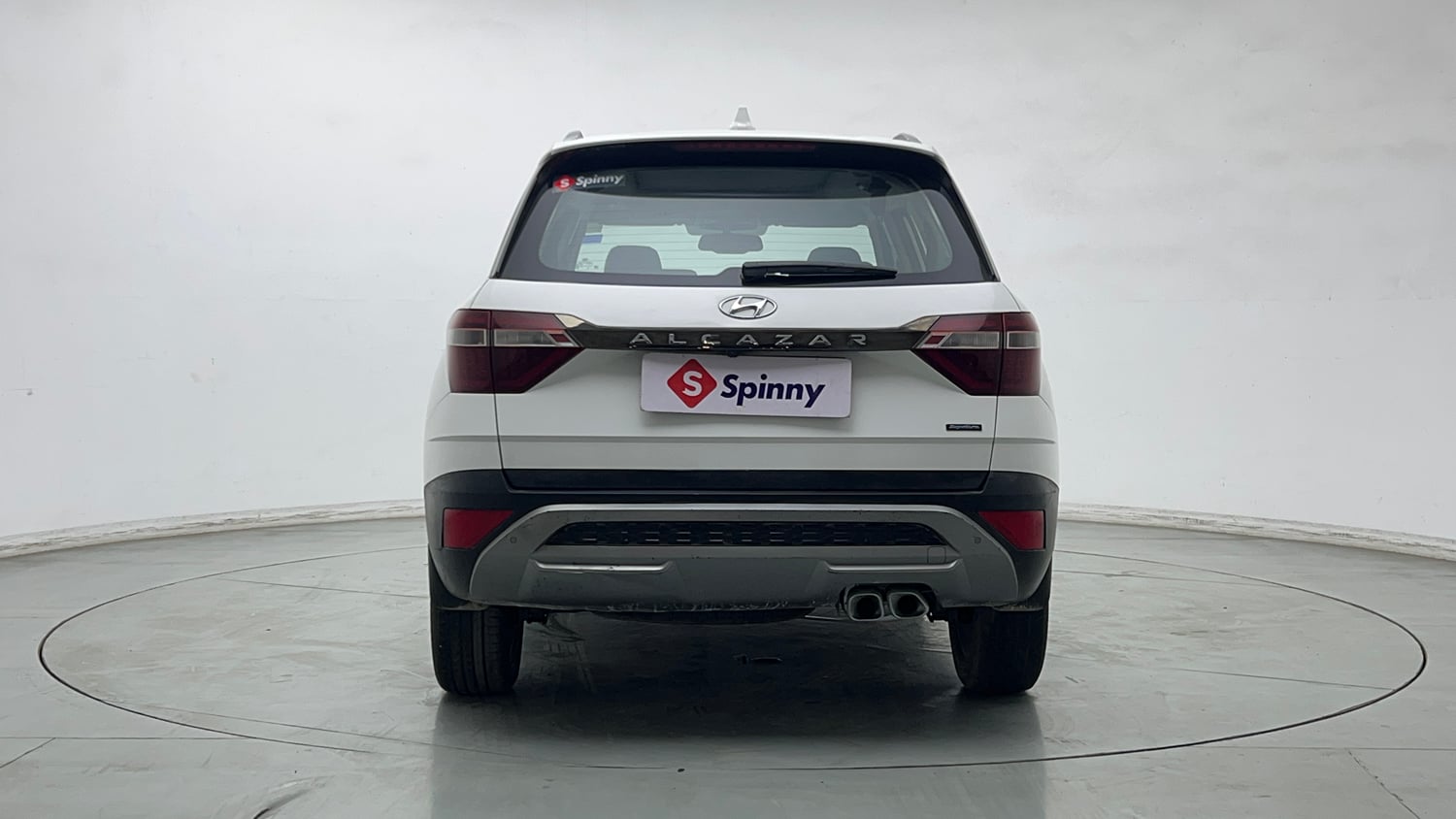 Used 2023 Hyundai Alcazar Signature (O) 7 STR 1.5 Petrol DCT Petrol Automatic exterior BACK VIEW