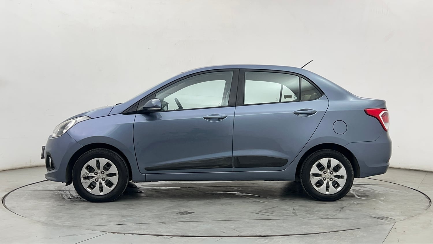 Used 2015 Hyundai Xcent S 1.2 Petrol Manual exterior LEFT SIDE VIEW
