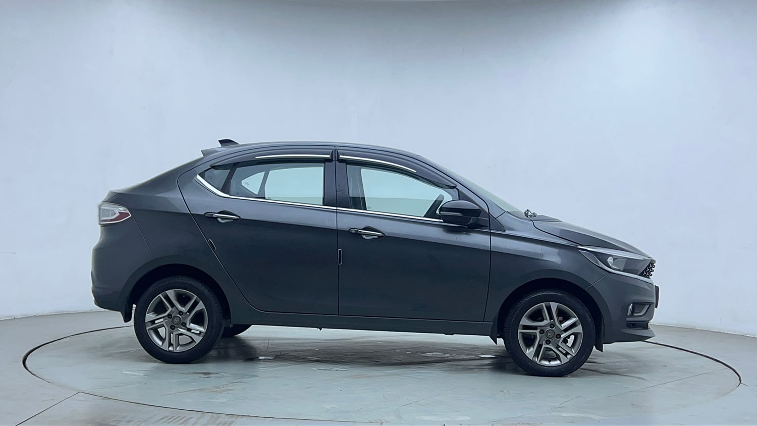 Used 2023 Tata Tigor XZ Plus Petrol Manual exterior RIGHT SIDE VIEW