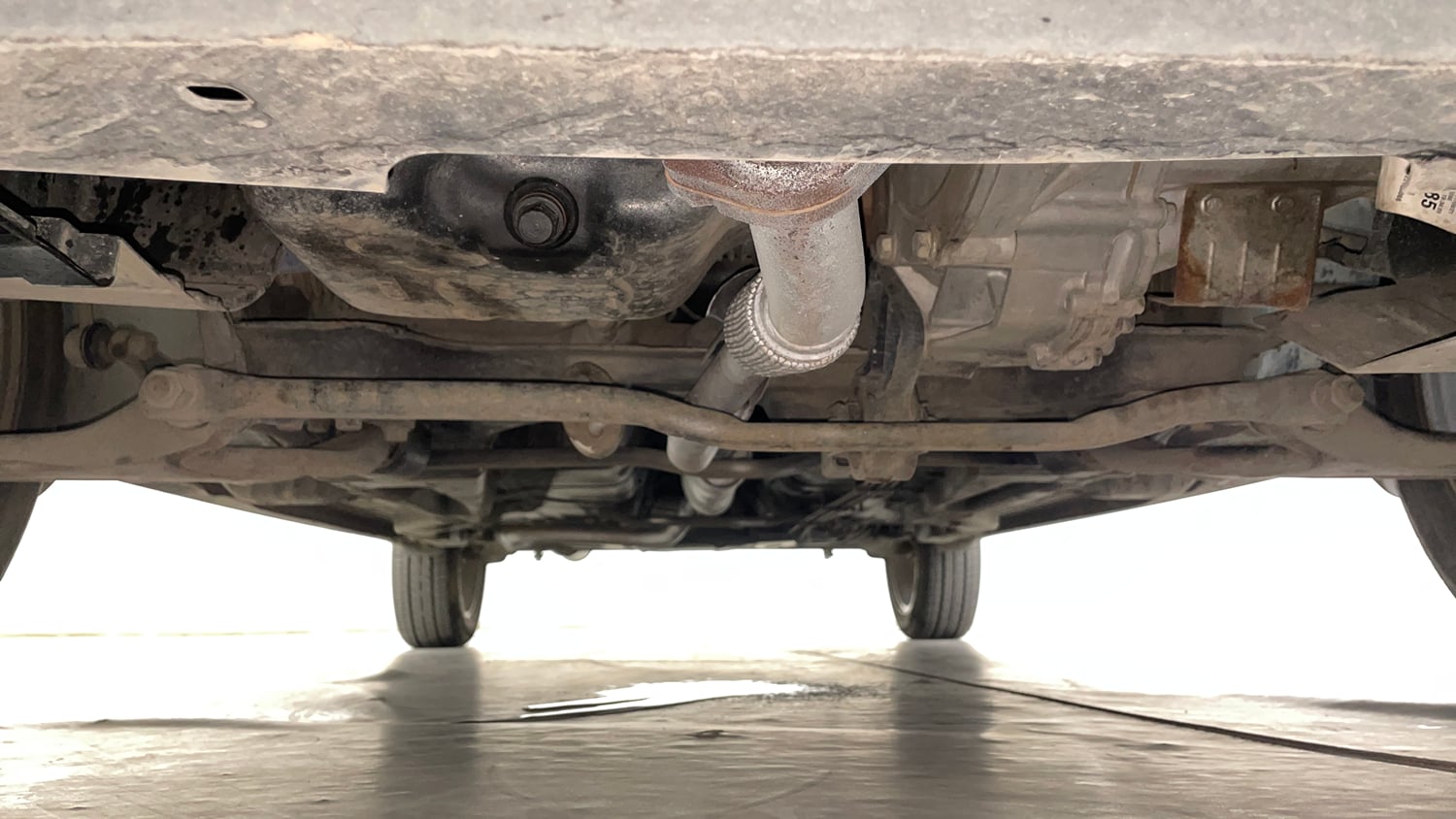 Used 2022 Tata Tigor XZA Plus Petrol Automatic extra FRONT LEFT UNDERBODY VIEW