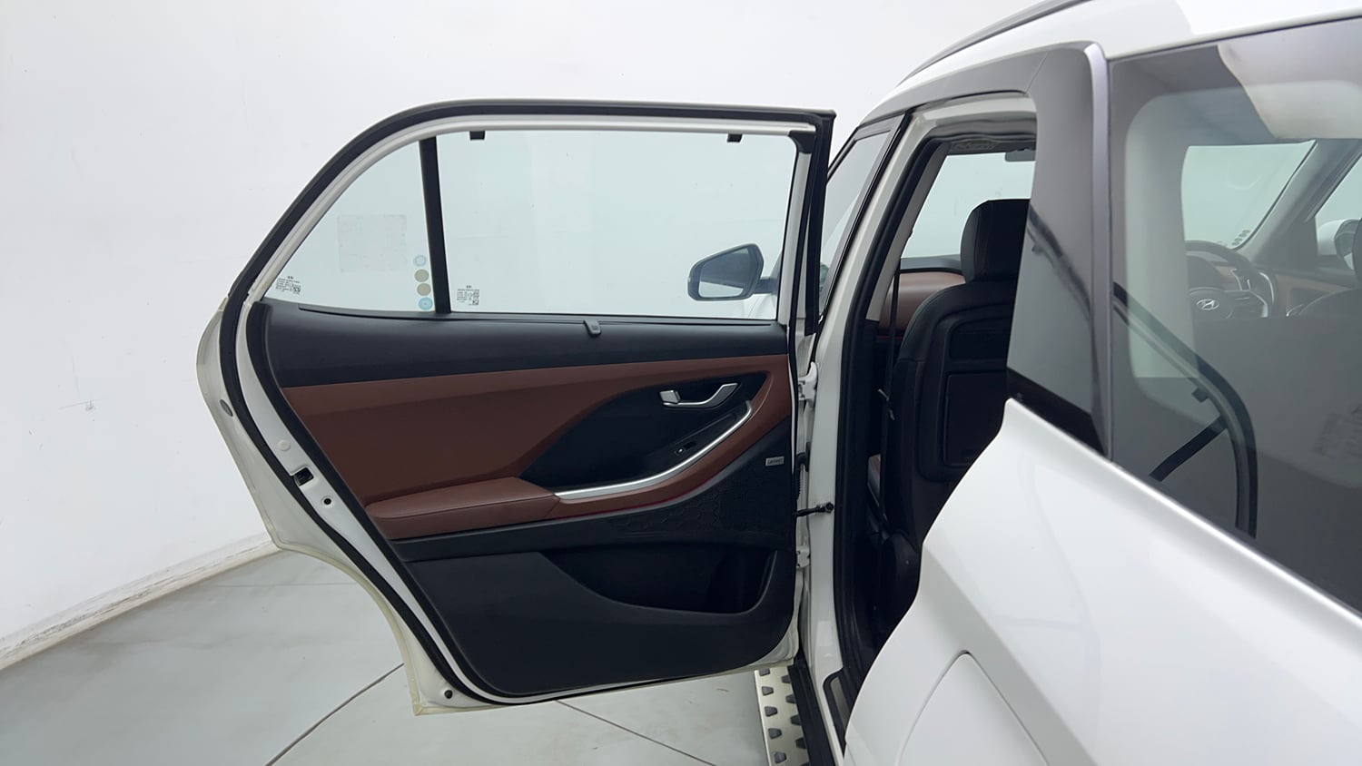 Used 2023 Hyundai Alcazar Signature (O) 7 STR 1.5 Petrol DCT Petrol Automatic interior LEFT REAR DOOR OPEN VIEW