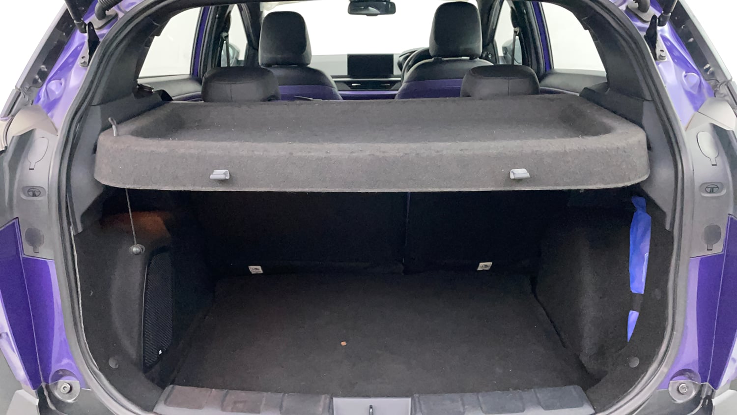 Used 2024 Tata Nexon Fearless Plus S Purple 1.2 Revotron Petrol 7DCA Dual Tone Petrol Automatic interior DICKY INSIDE VIEW