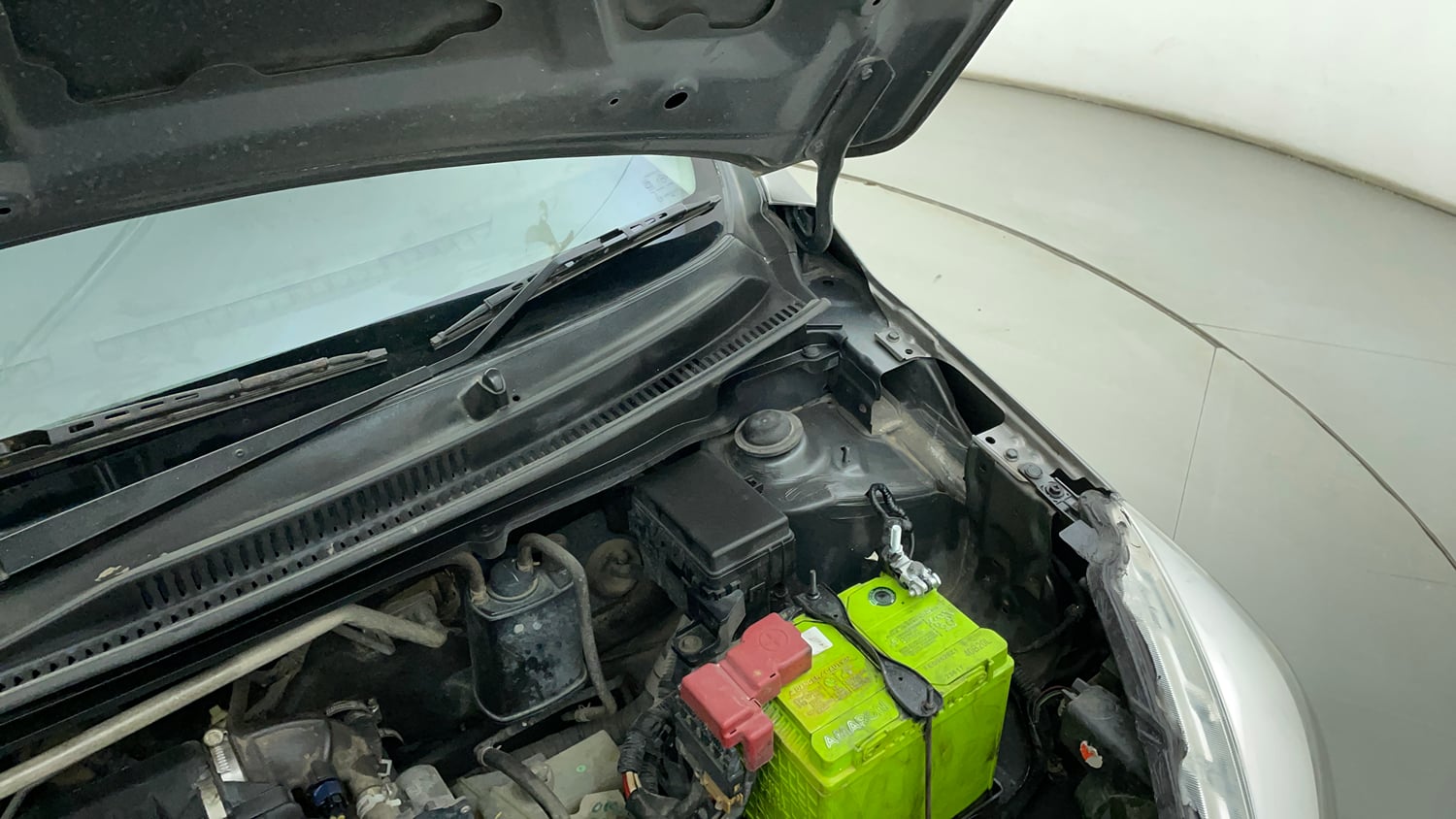 Used 2014 Maruti Suzuki Celerio VXi AMT Petrol Automatic engine ENGINE LEFT SIDE HINGE & APRON VIEW