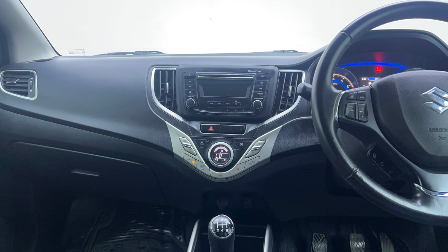 Used 2017 Maruti Suzuki Baleno Zeta 1.2 Petrol Manual interior MUSIC SYSTEM & AC CONTROL VIEW