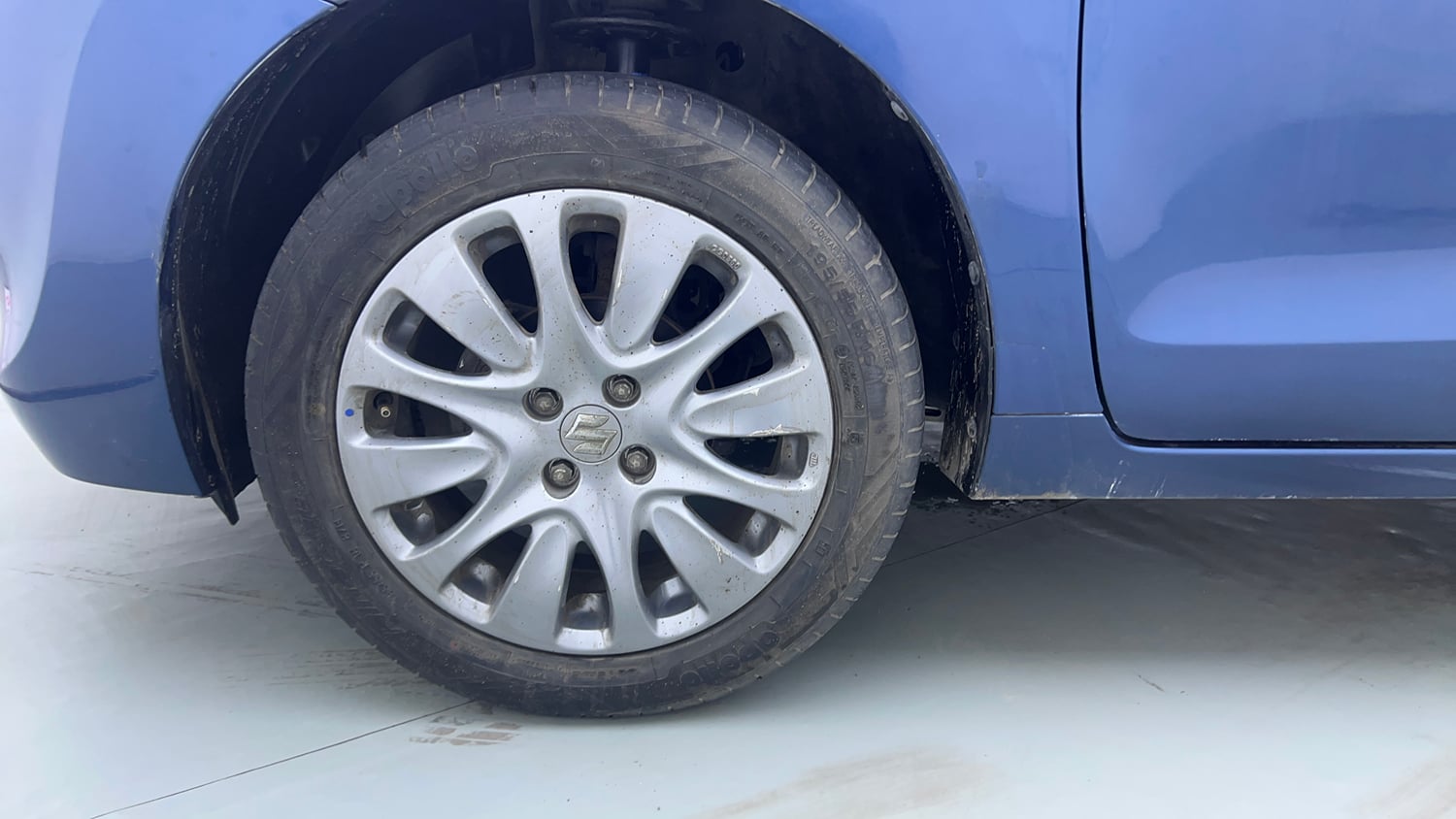 Used 2017 Maruti Suzuki Baleno Zeta 1.2 Petrol Manual tyres LEFT FRONT TYRE RIM VIEW