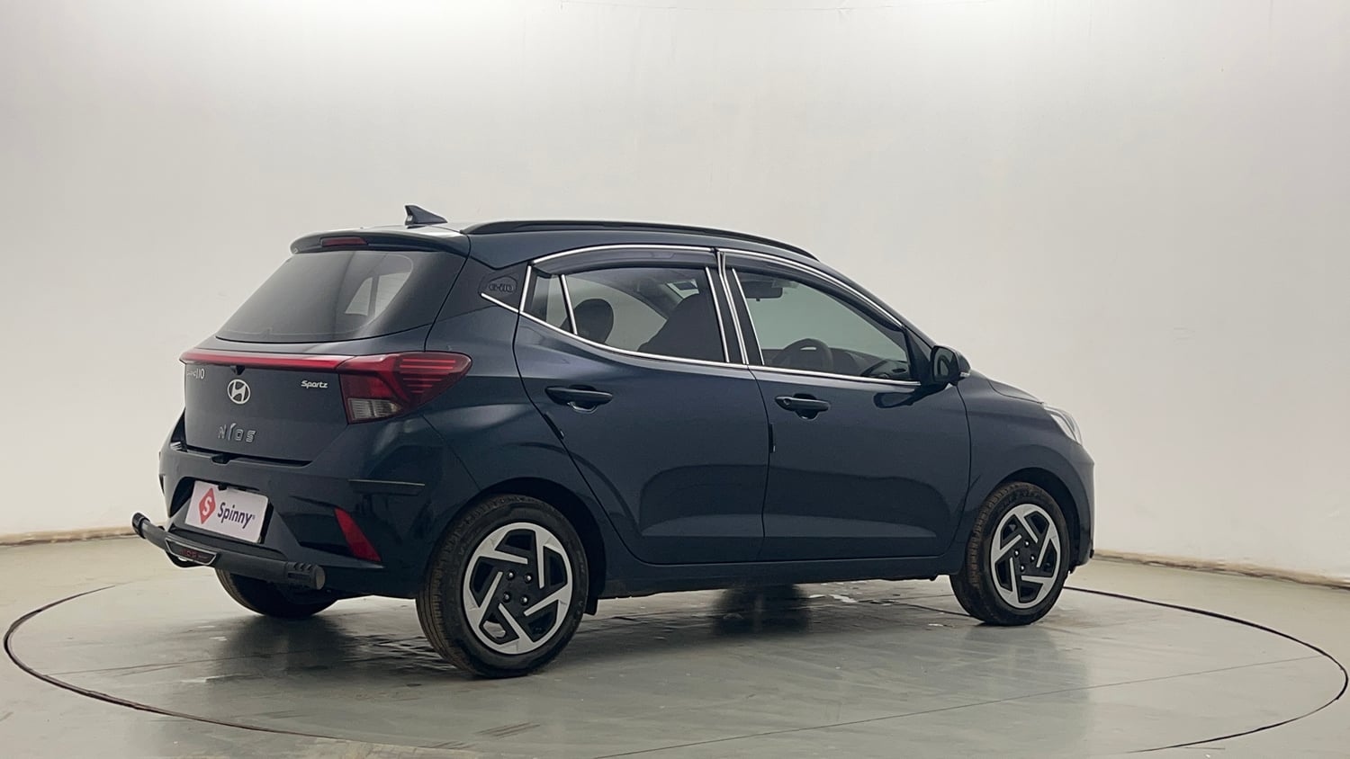 Used 2026 Hyundai Grand i10 Nios Sportz 1.2 Kappa VTVT Petrol Manual exterior RIGHT REAR CORNER VIEW