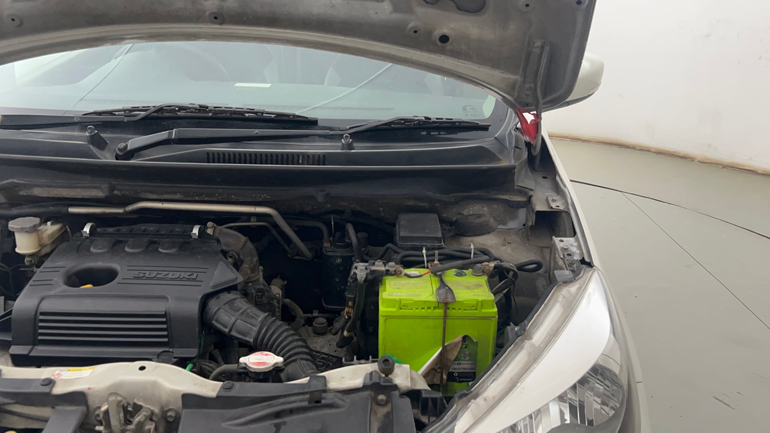 Used 2015 Maruti Suzuki Celerio ZXi AMT Petrol Automatic engine ENGINE LEFT SIDE HINGE & APRON VIEW