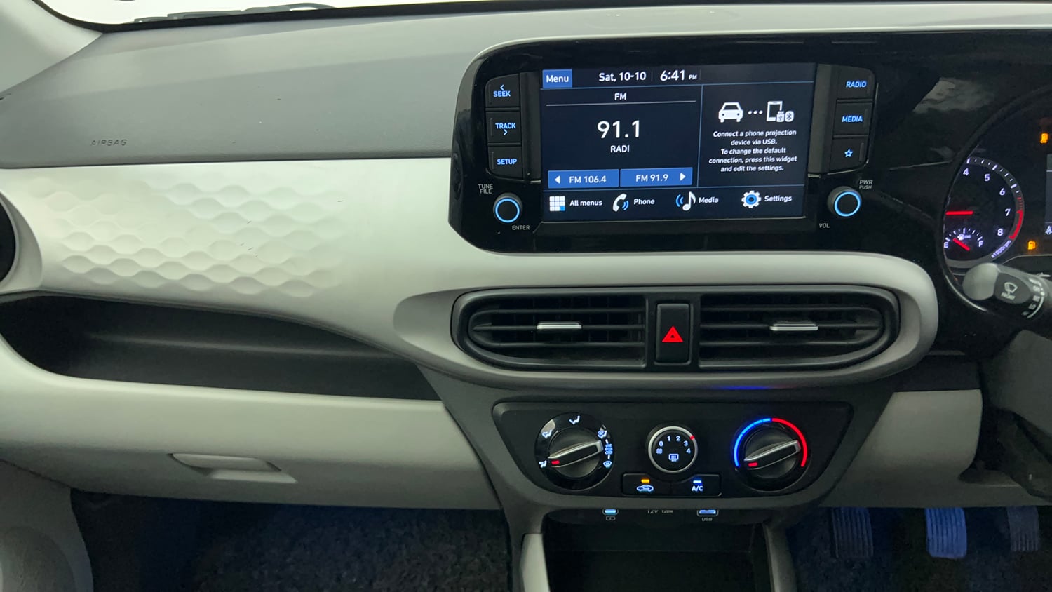 Used 2024 Hyundai Grand i10 Nios Sportz 1.2 Hy-CNG Duo Cng Manual interior MUSIC SYSTEM & AC CONTROL VIEW