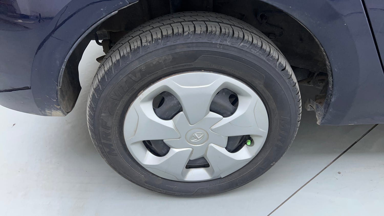 Used 2021 Tata Tigor XM Petrol Manual tyres RIGHT REAR TYRE RIM VIEW