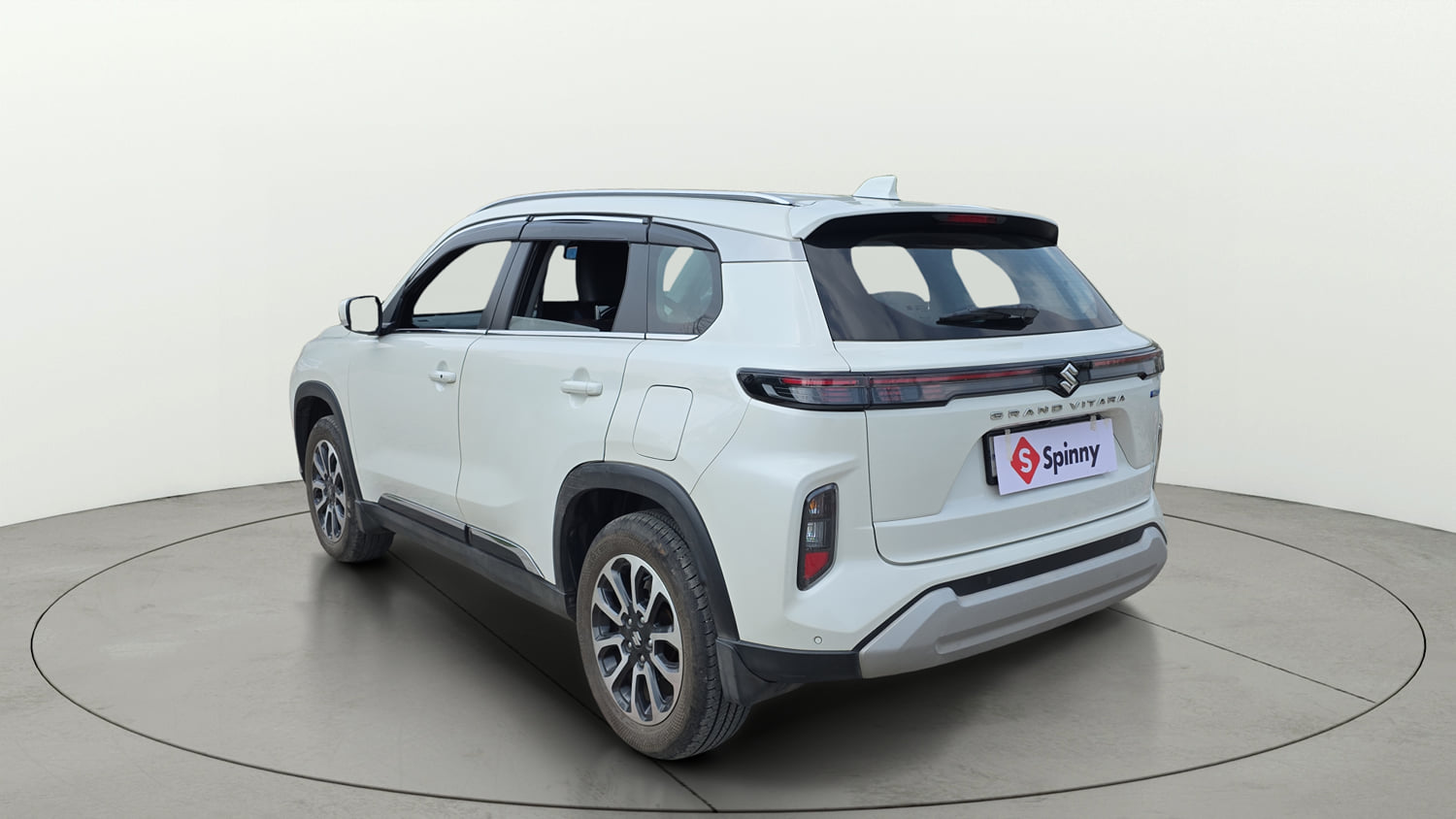 Used 2023 Maruti Suzuki Grand Vitara Zeta Smart Hybrid Petrol Manual exterior LEFT REAR CORNER VIEW