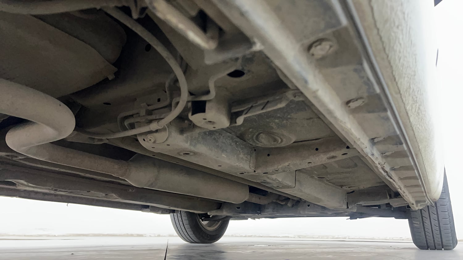 Used 2012 Maruti Suzuki Swift Dzire ZXI Petrol Manual extra REAR RIGHT UNDERBODY VIEW