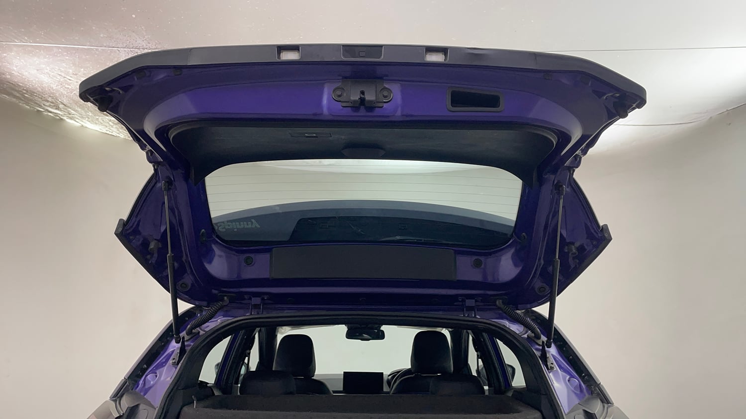 Used 2024 Tata Nexon Fearless Plus S Purple 1.2 Revotron Petrol 7DCA Dual Tone Petrol Automatic interior DICKY DOOR OPEN VIEW