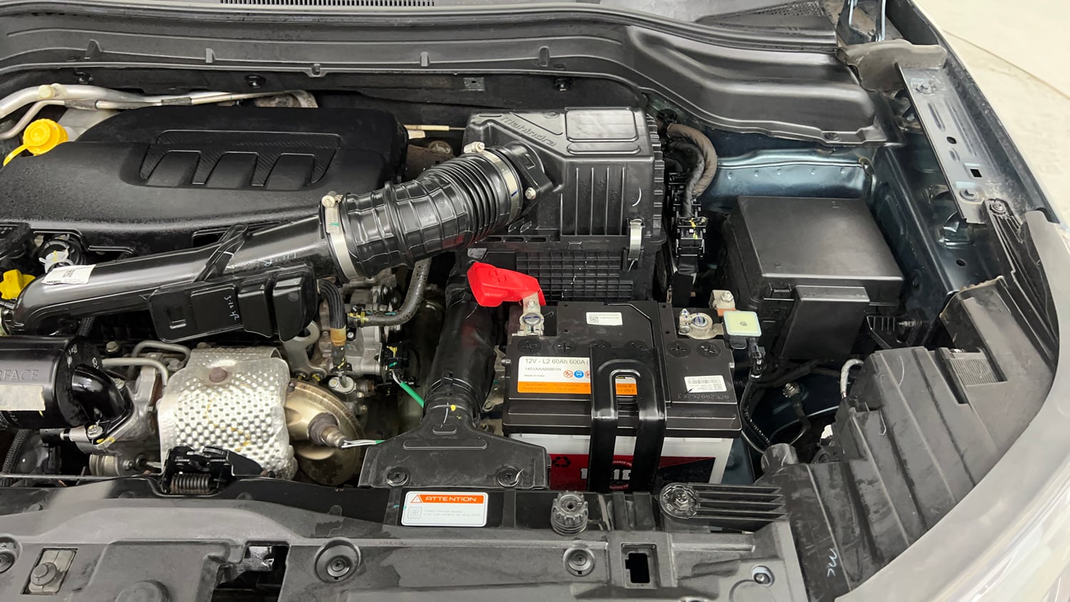 Used 2023 Mahindra XUV 300 W8 (O) 1.2 Petrol AMT Petrol Automatic engine ENGINE LEFT SIDE VIEW