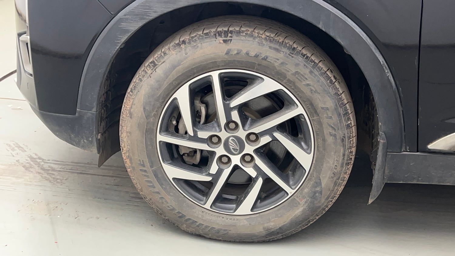 Used 2022 Mahindra XUV 300 W8 (O) 1.2 Petrol Petrol Manual tyres LEFT FRONT TYRE RIM VIEW