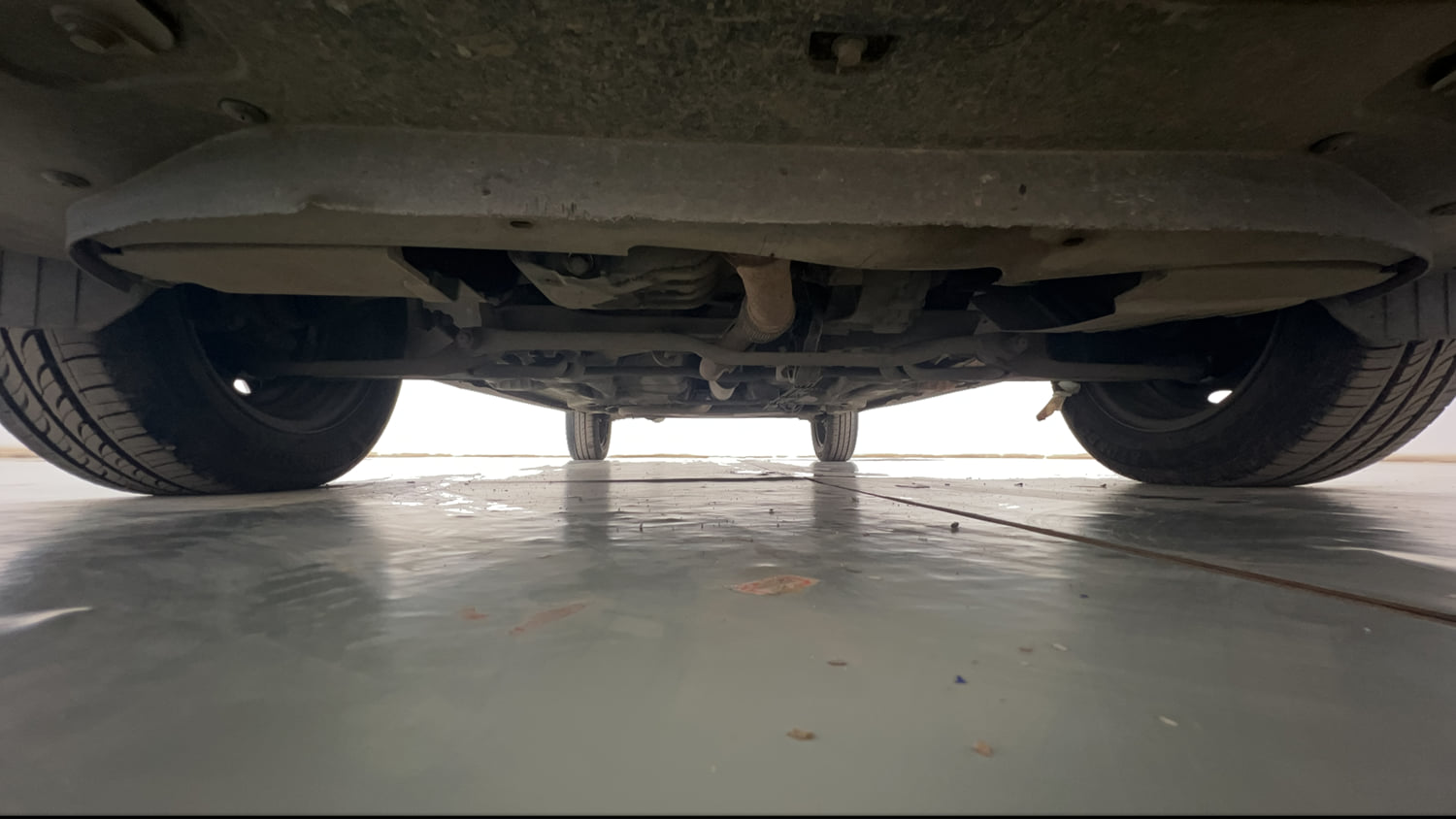 Used 2020 Tata Tigor Revotron XZ Petrol Manual extra FRONT LEFT UNDERBODY VIEW